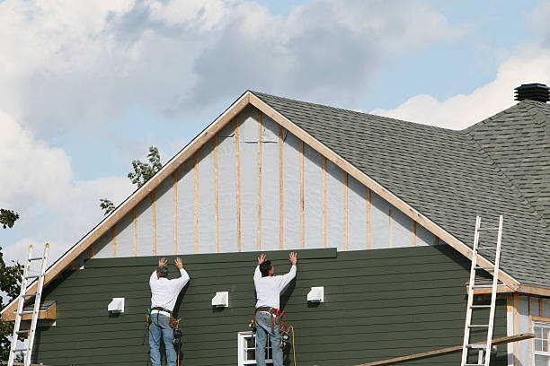 Professional Emergency Siding Repair technician working in West Union, OH
